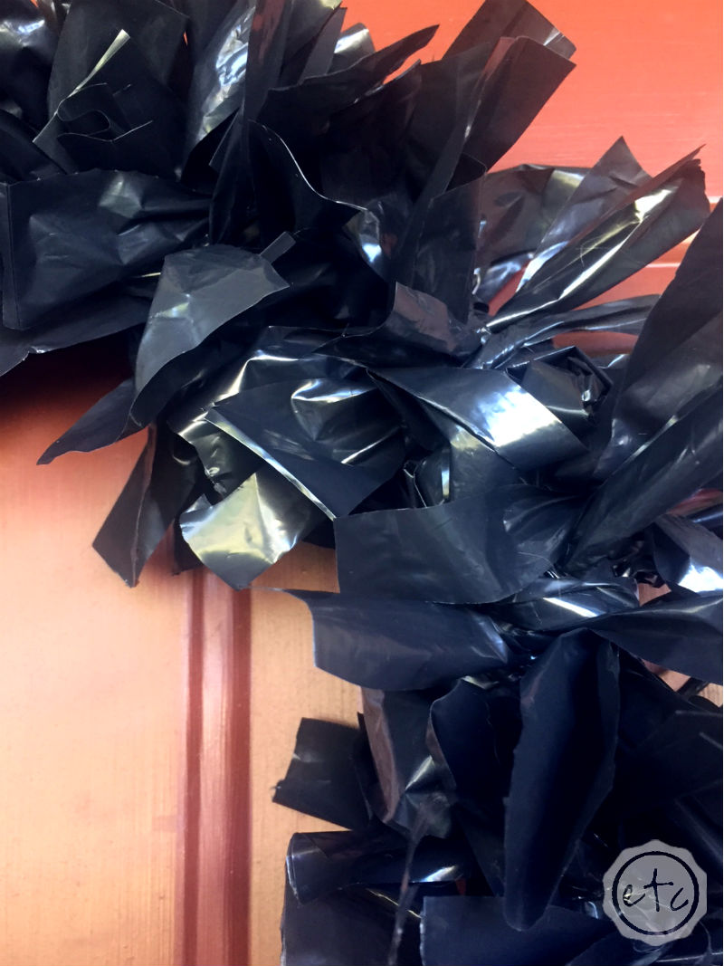 How to Make a Fun Halloween Wreath with a Coat Hanger and Hefty Trash Bags!